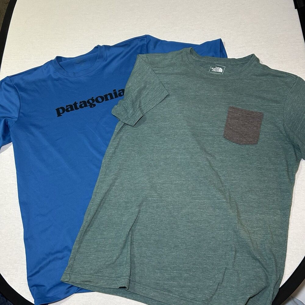 2 short-sleeve t-shirts L: blue Patagonia Capilene, green heathered TNF